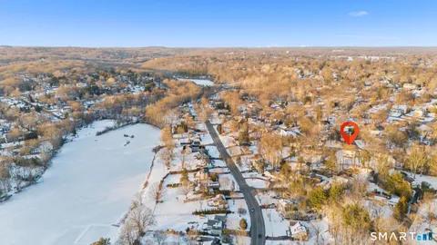 a stove top oven sitting inside of a kitchen