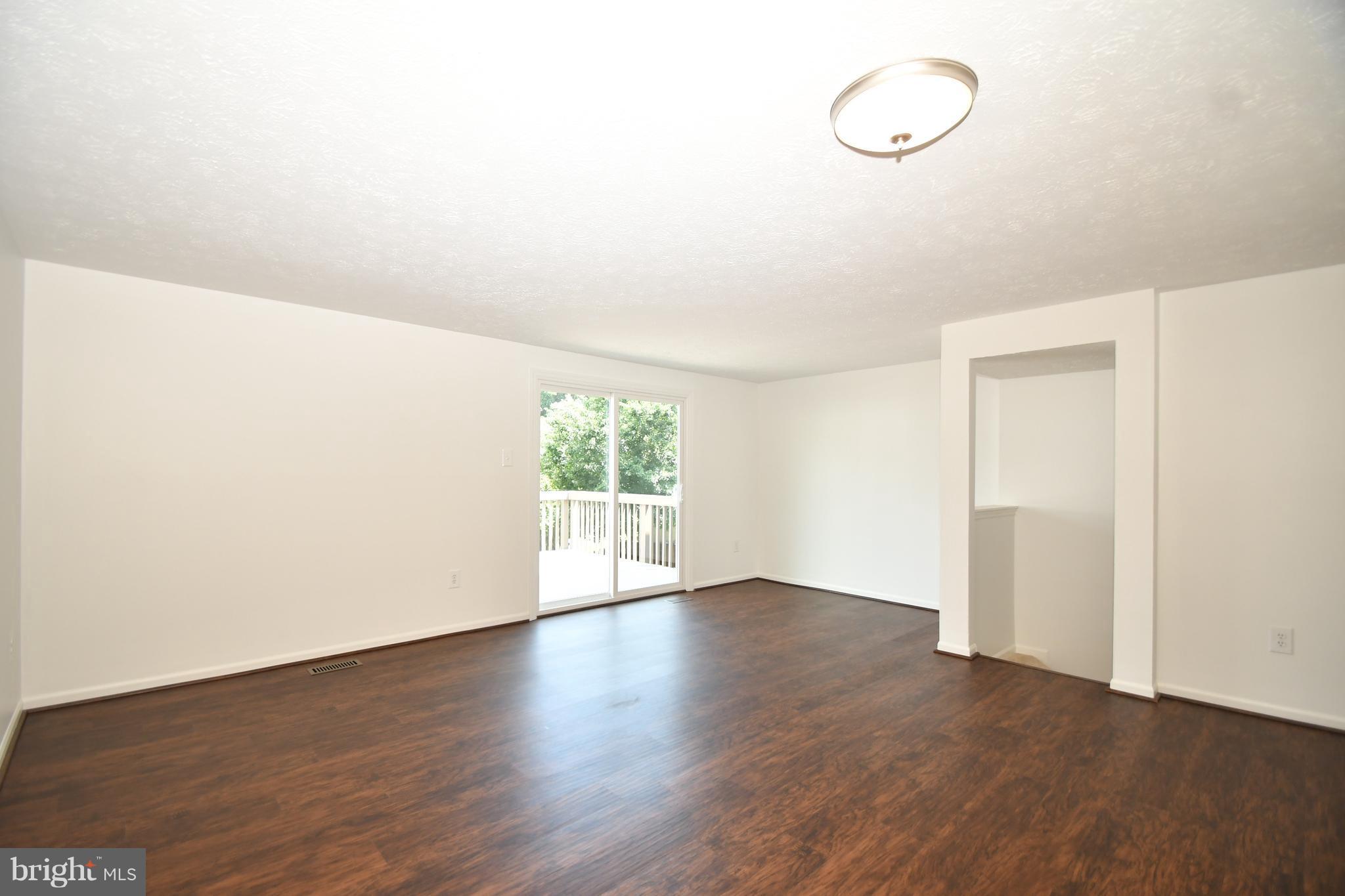 5010 Clifford Road Perry Hall, MD 21128 - Photo 24 of 30 Living Room w/Sliders to Deck