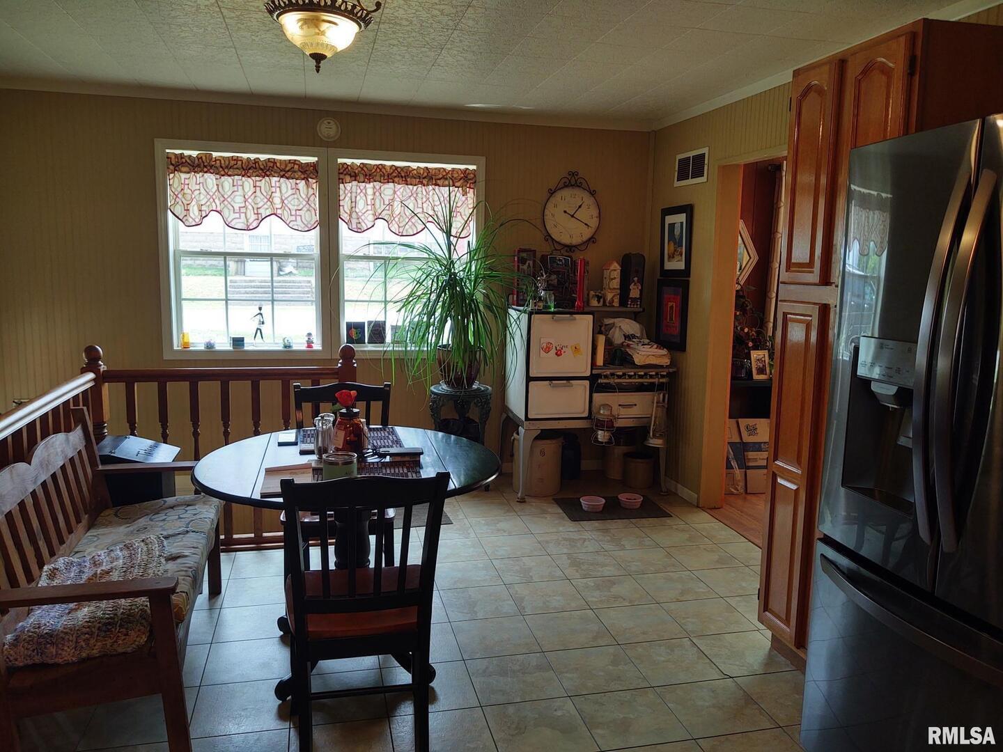601 Ohio Street Grand Chain, IL 62941 - Photo 10 of 32 a view of a dining room with furniture window and wooden floor