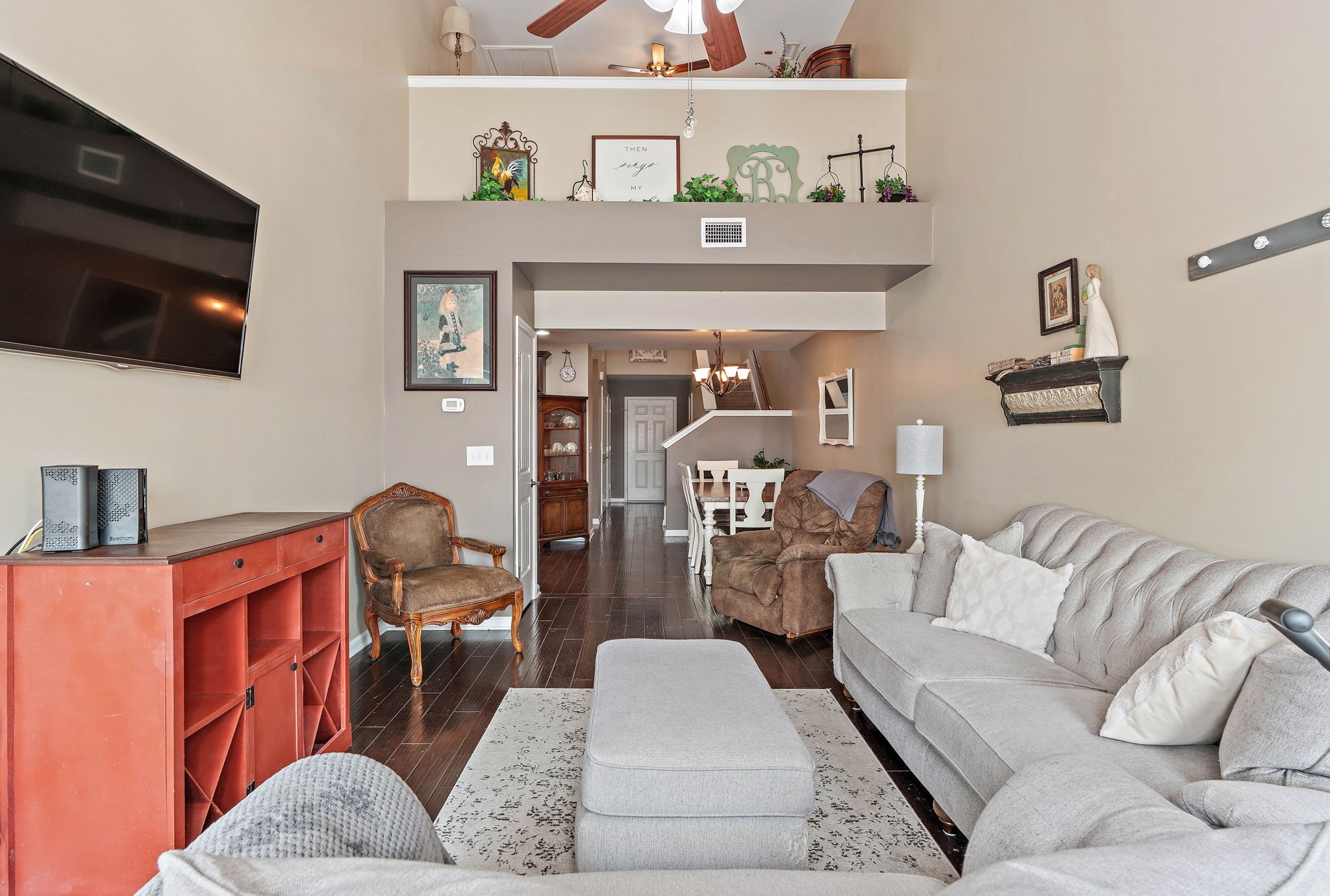 1071 Muna Court Spring Hill, TN 37174 - Photo 6 of 50 a living room with furniture and a flat screen tv