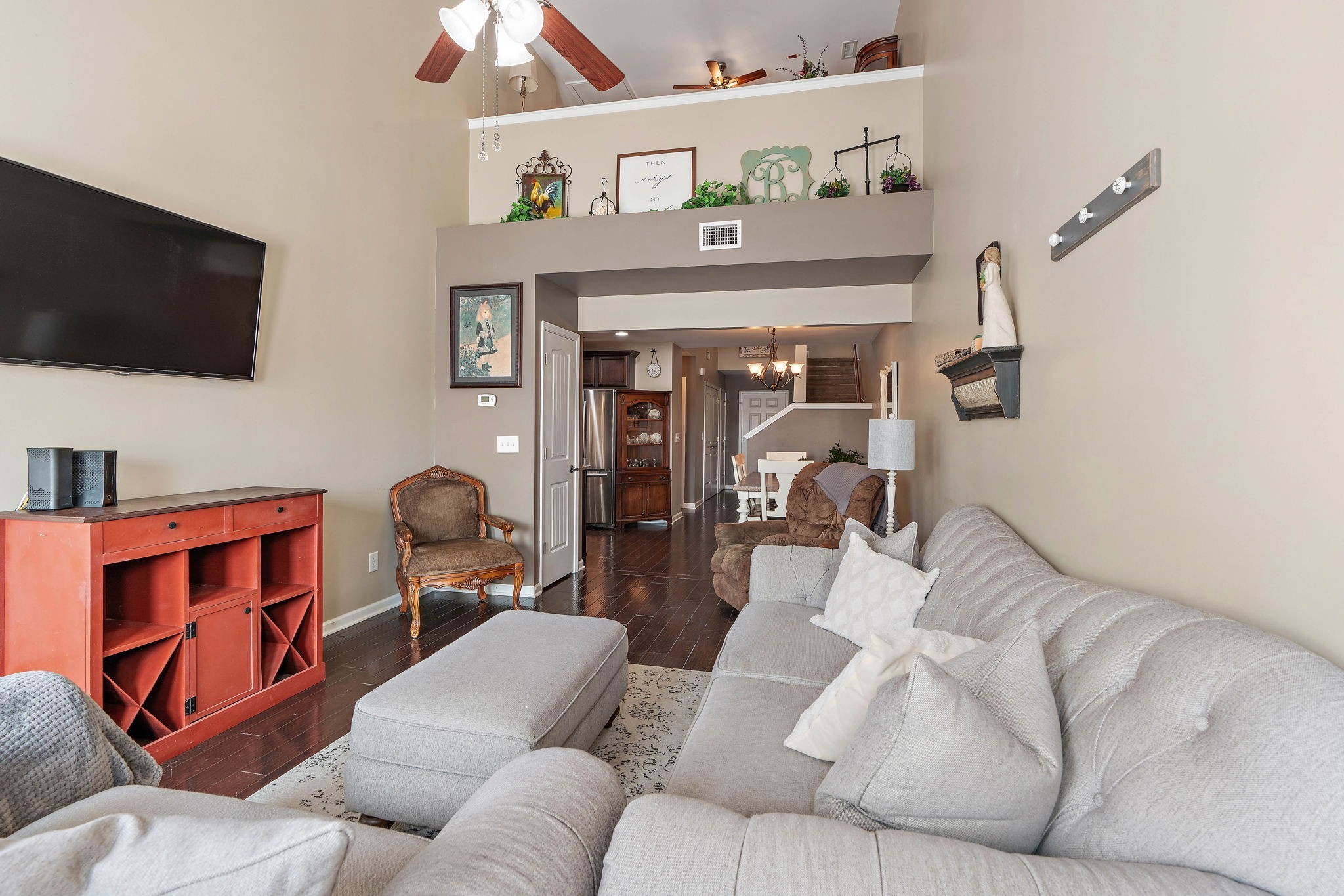 1071 Muna Court Spring Hill, TN 37174 - Photo 8 of 50 a living room with furniture and a flat screen tv