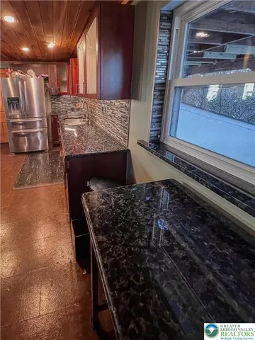 a water heater on the kitchen counter top