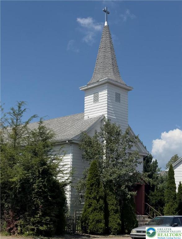 608 McKinley Street Hazleton, PA 18201 - Photo 2 of 59 a aerial view of a house with a yard and potted plants
