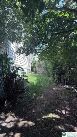 a view of outdoor space and yard