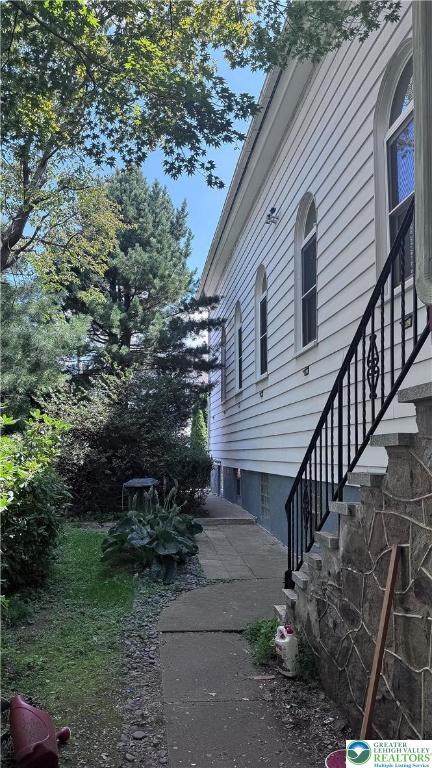 608 McKinley Street Hazleton, PA 18201 - Photo 50 of 59 a view of a house with a yard