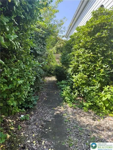a view of outdoor space and yard