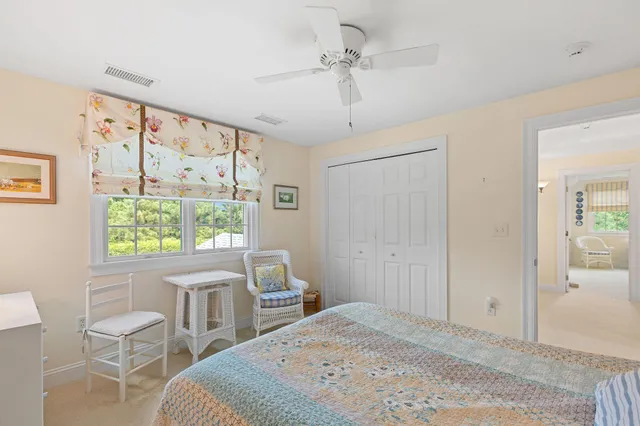 a view of a bathroom with a tub and shower