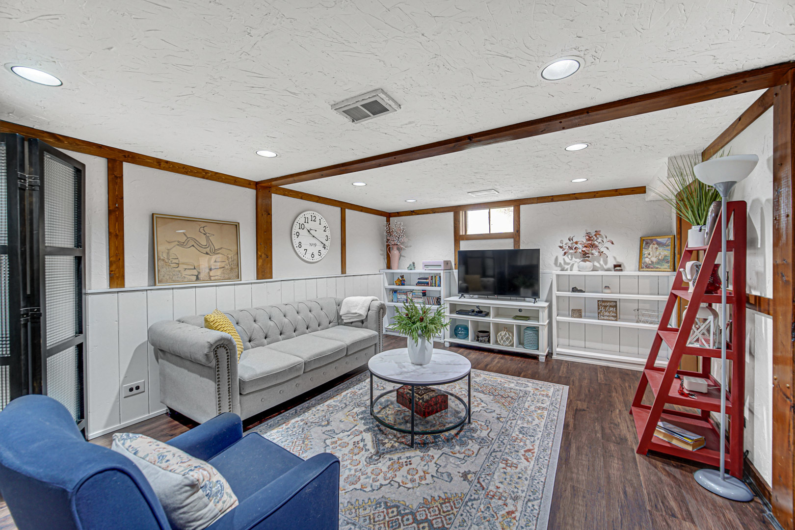 1202 Birch Drive Mount Prospect, IL 60056 - Photo 14 of 22 a living room with furniture and a flat screen tv