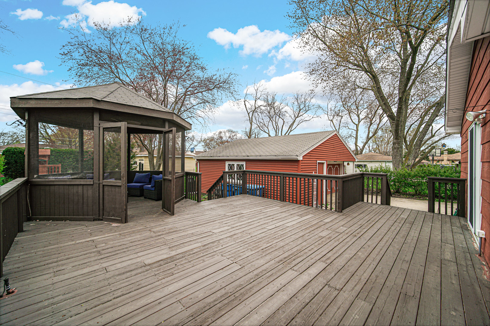 1202 Birch Drive Mount Prospect, IL 60056 - Photo 17 of 22 a view of a house with a wooden deck