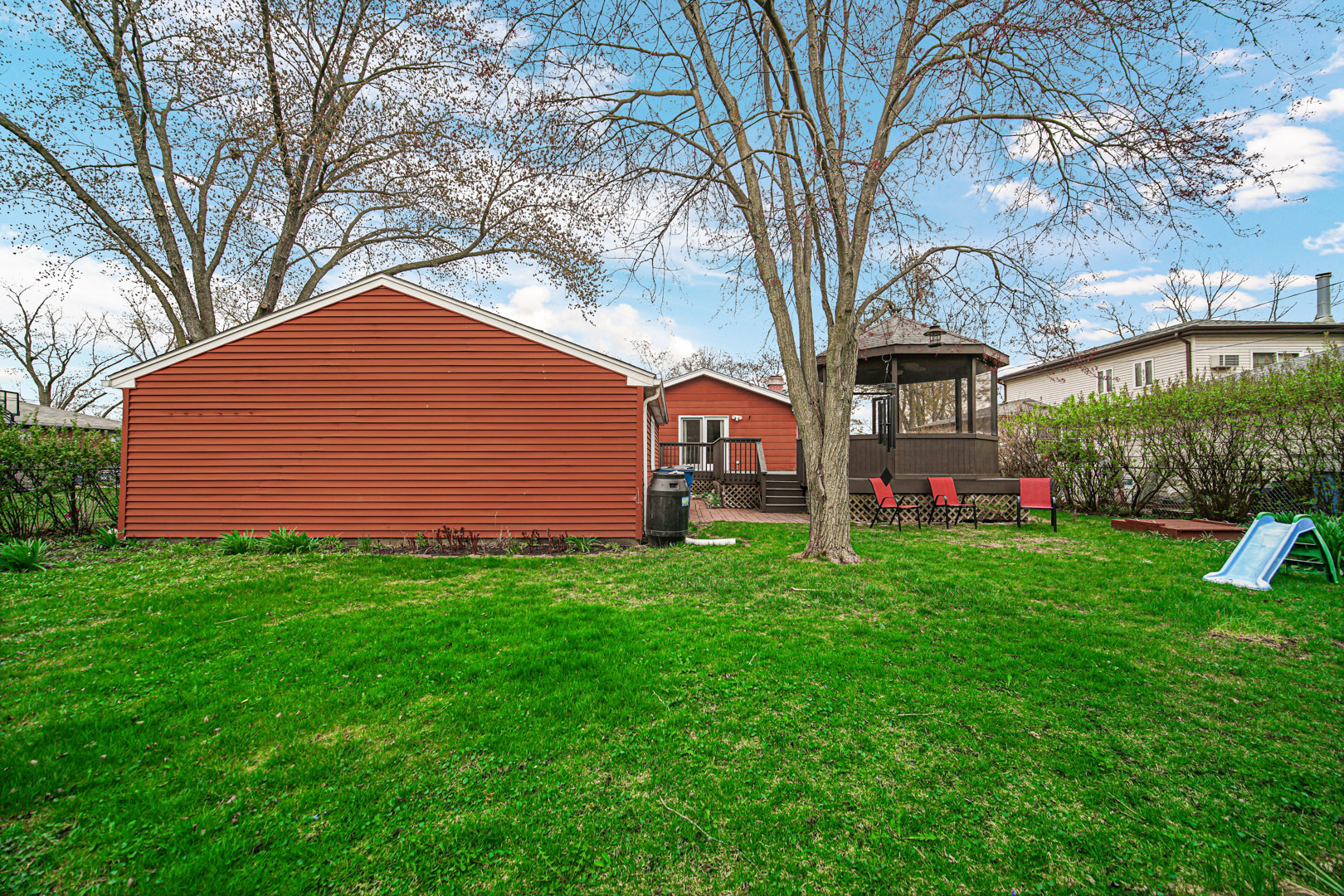 1202 Birch Drive Mount Prospect, IL 60056 - Photo 18 of 22 a front view of a house with garden