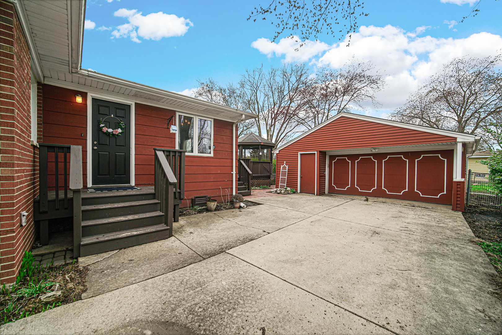 1202 Birch Drive Mount Prospect, IL 60056 - Photo 20 of 22 a front view of a house with garden