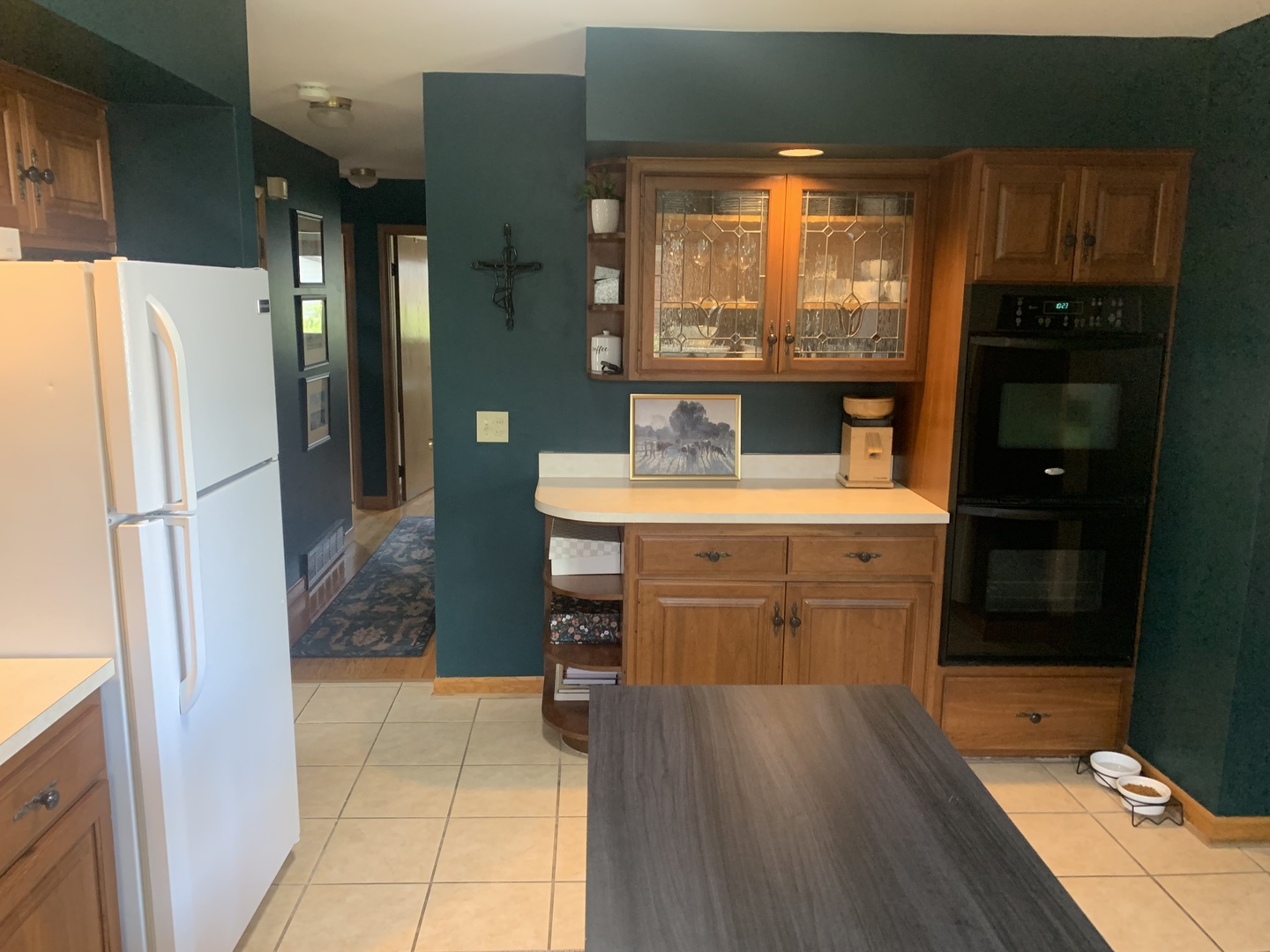 1202 Birch Drive Mount Prospect, IL 60056 - Photo 5 of 22 a room with a refrigerator and a sink