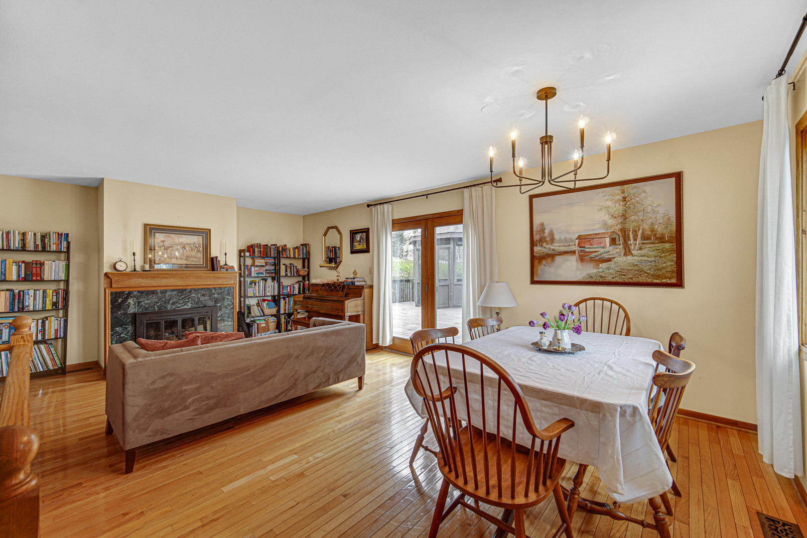 1202 Birch Drive Mount Prospect, IL 60056 - Photo 6 of 22 a view of a dining room with furniture wooden floor and chandelier