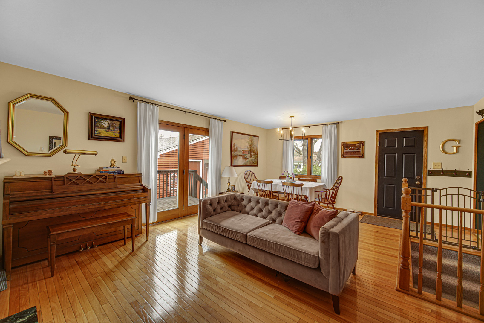 1202 Birch Drive Mount Prospect, IL 60056 - Photo 7 of 22 a living room with furniture and a wooden floor