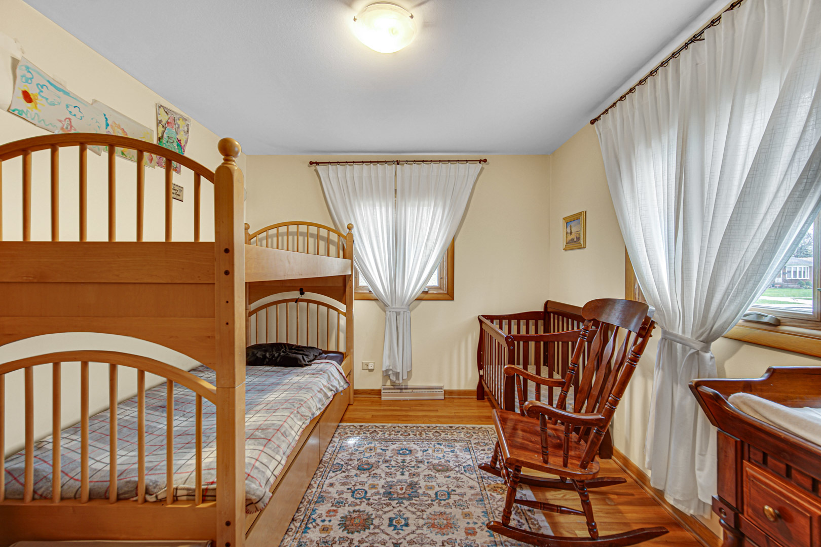 1202 Birch Drive Mount Prospect, IL 60056 - Photo 10 of 22 a living room with furniture and a window