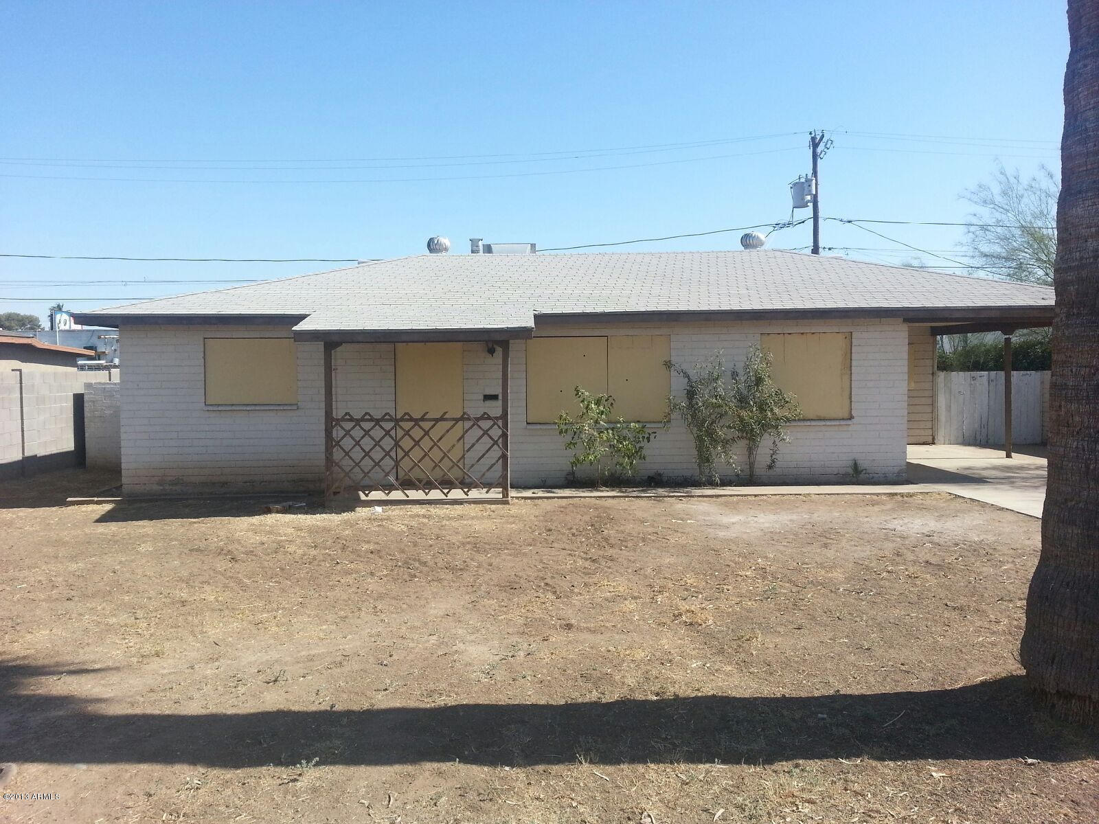 3633 West Almeria Road Phoenix, AZ 85009 - Photo 1 of 27 Front