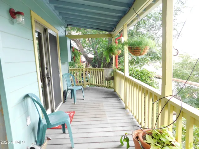 a bedroom with a bed and a mirror