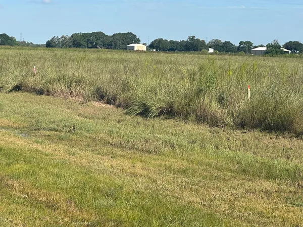 a view of lake with mountain in the background