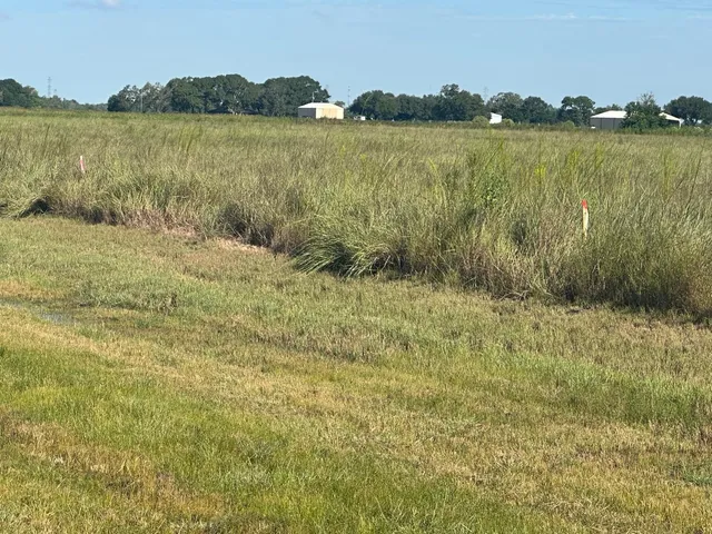 a view of lake with mountain in the background