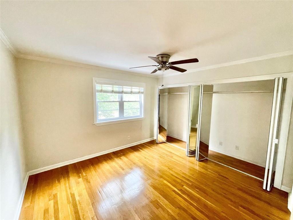 3660 Peachtree Road, Unit C3 Atlanta, GA 30319 - Photo 11 of 21 a view of a big room with wooden floor and windows