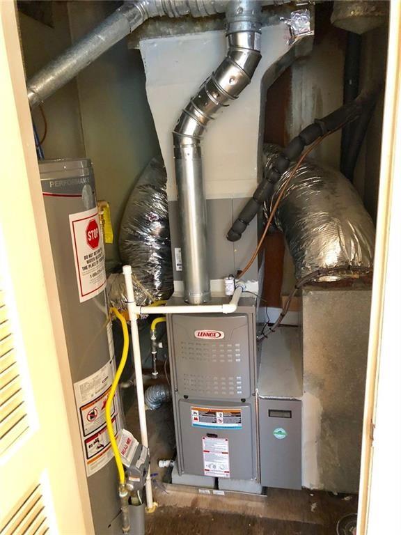 3660 Peachtree Road, Unit C3 Atlanta, GA 30319 - Photo 14 of 21 a utility room with multiple dryer and washer