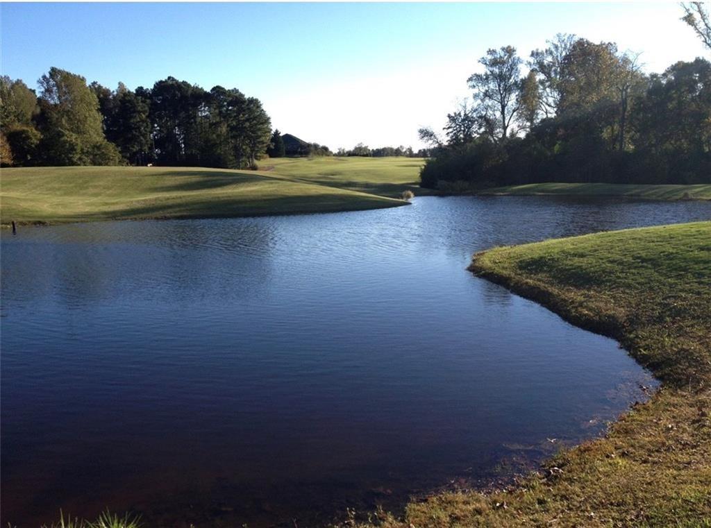 853 Club Drive Commerce, GA 30530 - Photo 6 of 7 a view of a house with a yard