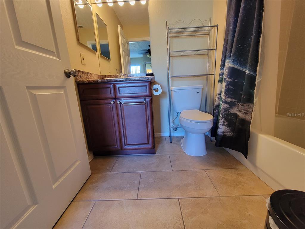 3705 Southwest 27th Street, Unit 1016 Gainesville, FL 32608 - Photo 15 of 31 a bathroom with a toilet and a sink