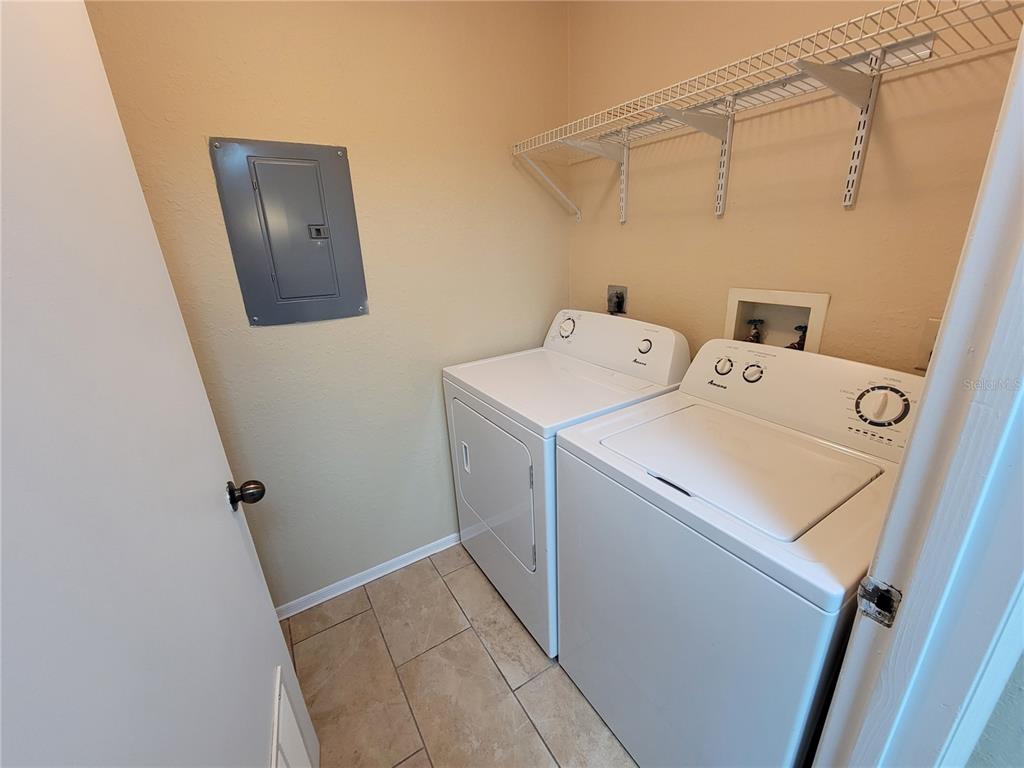 3705 Southwest 27th Street, Unit 1016 Gainesville, FL 32608 - Photo 20 of 31 a utility room with dryer and washer