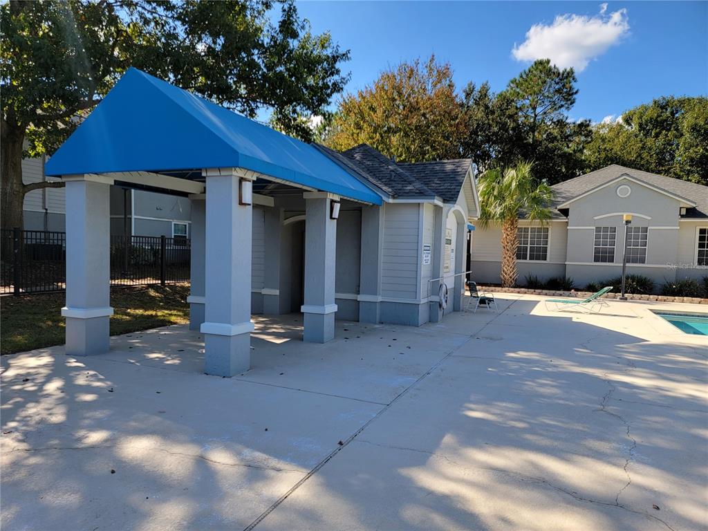 3705 Southwest 27th Street, Unit 1016 Gainesville, FL 32608 - Photo 24 of 31 a front view of a house with a yard