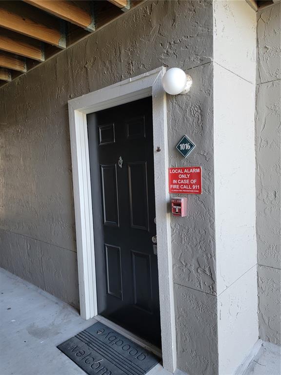 3705 Southwest 27th Street, Unit 1016 Gainesville, FL 32608 - Photo 3 of 31 a elevator with glass door