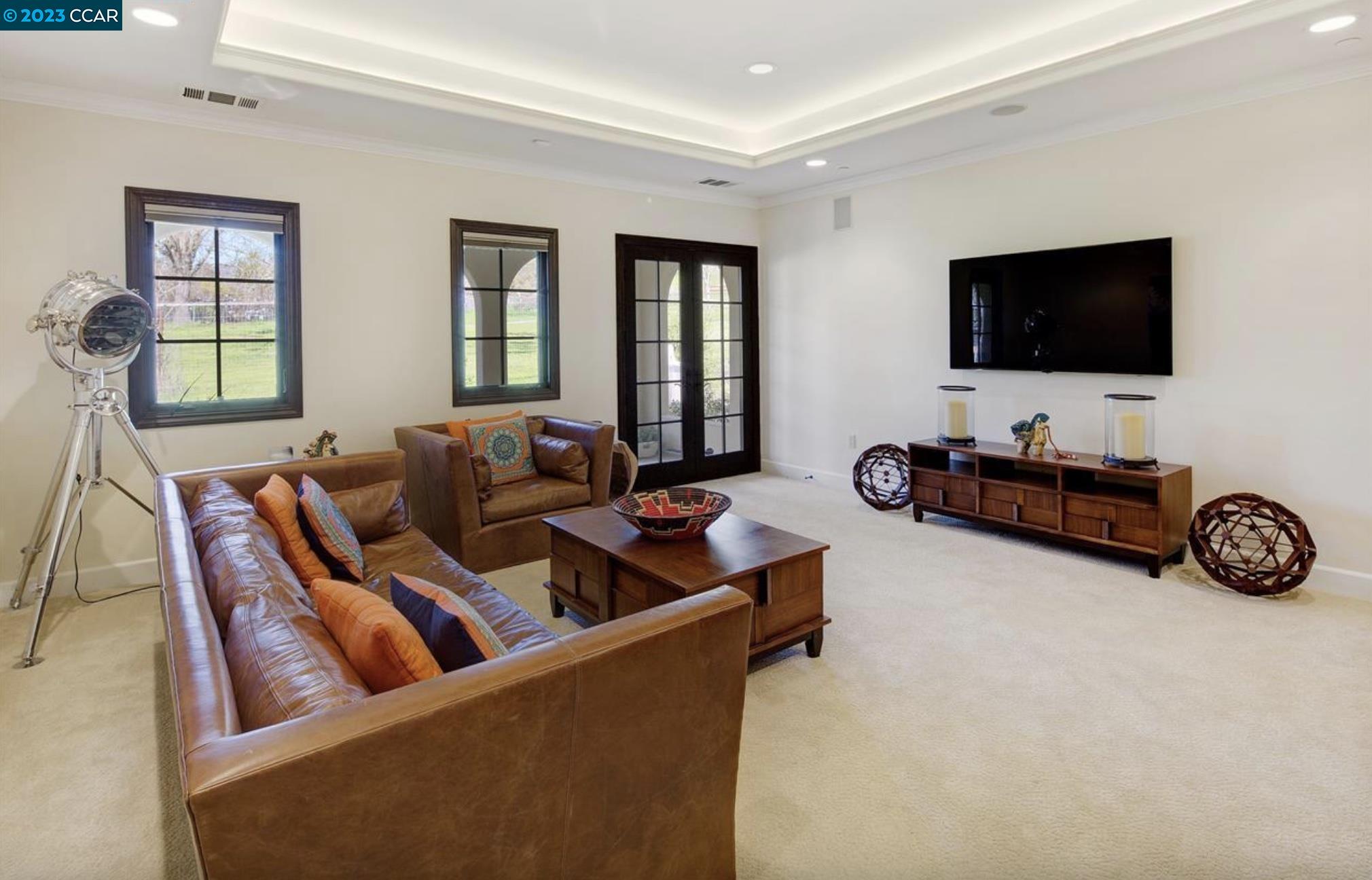 23 Eckley Lane Walnut Creek, CA 94596 - Photo 19 of 47 a living room with furniture and a flat screen tv