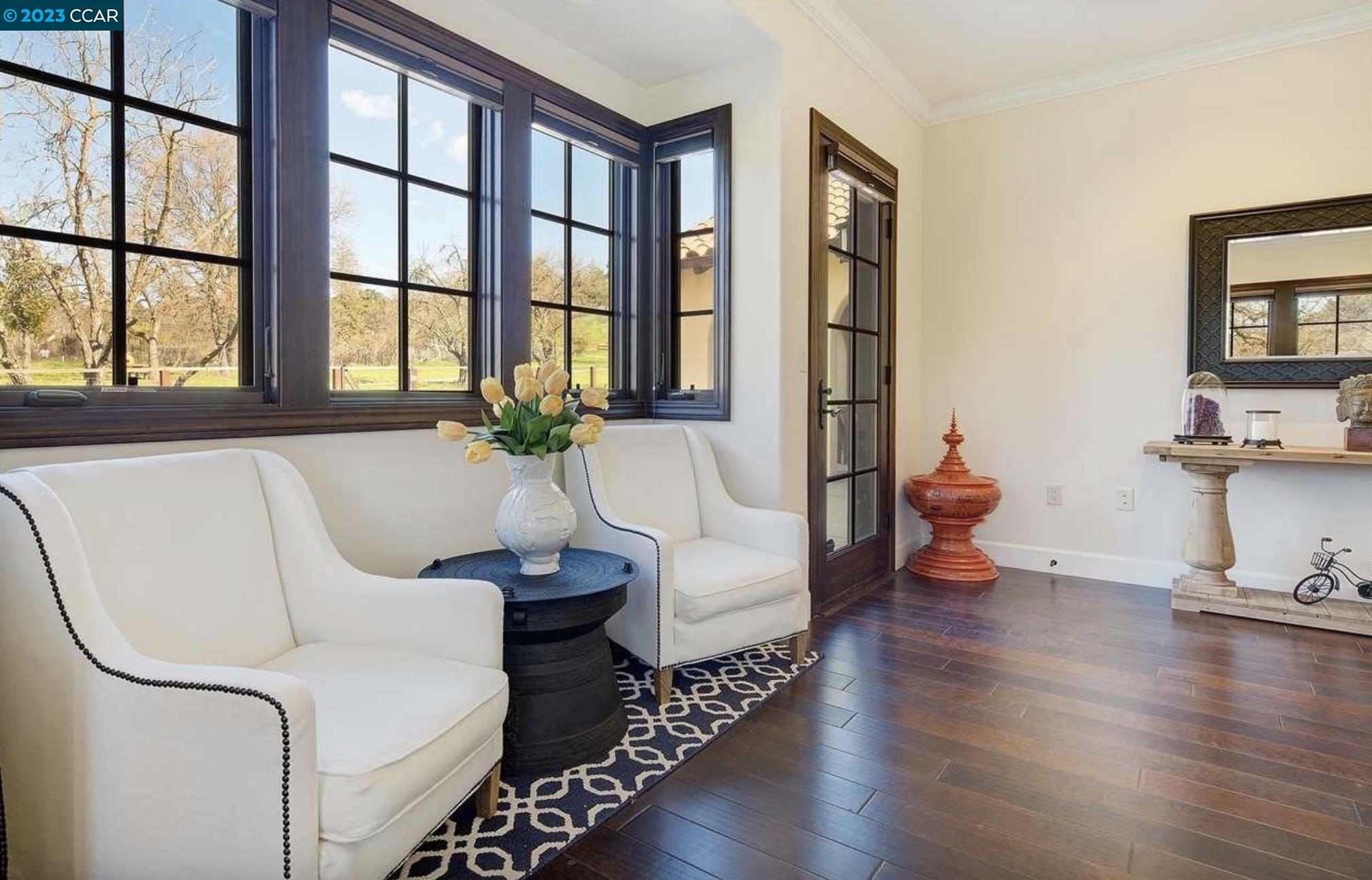 23 Eckley Lane Walnut Creek, CA 94596 - Photo 26 of 47 a living room with furniture and a large window