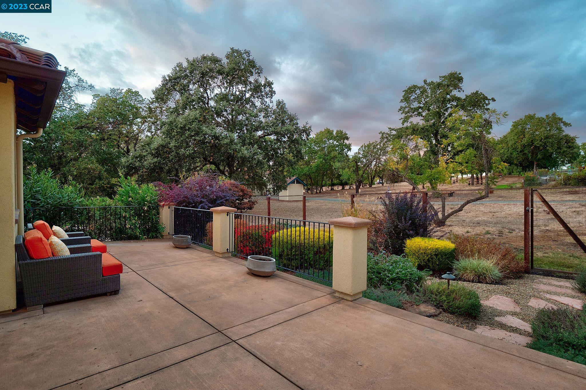 23 Eckley Lane Walnut Creek, CA 94596 - Photo 43 of 47 a backyard of a house with table and chairs