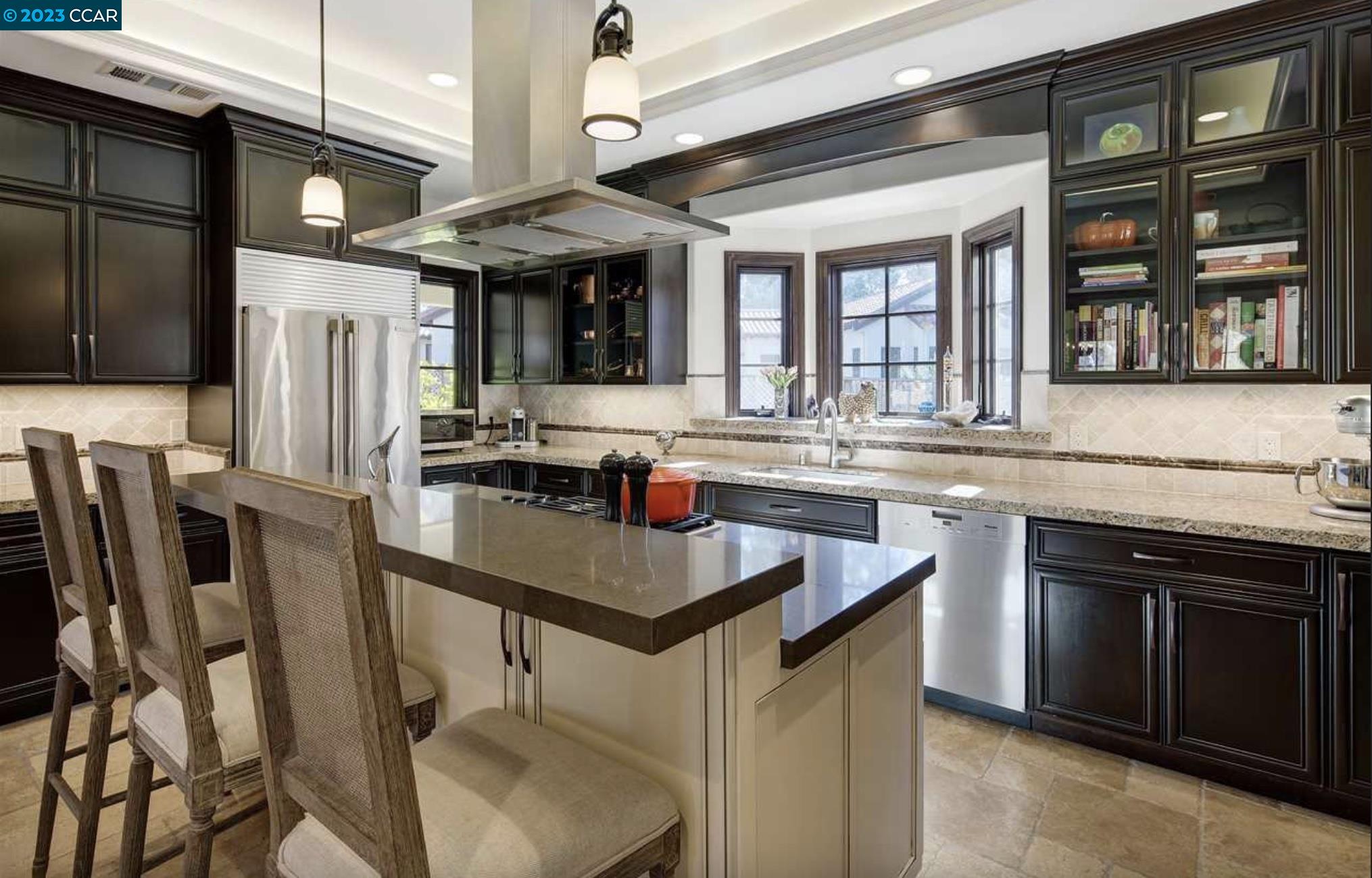 23 Eckley Lane Walnut Creek, CA 94596 - Photo 9 of 47 a kitchen with stainless steel appliances granite countertop a stove and a sink