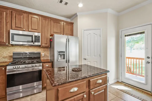 a view of a park with a tree