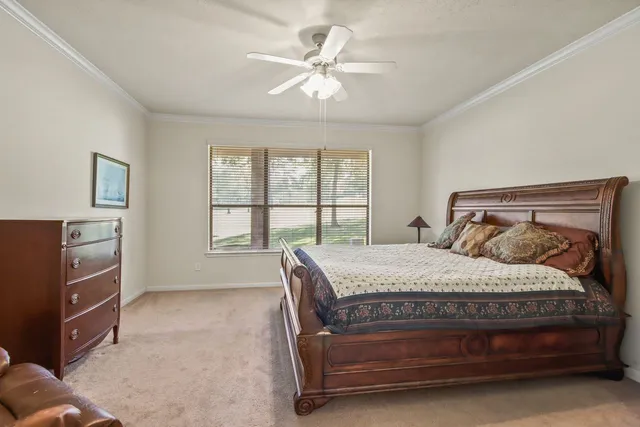 a bedroom with a bed and furniture