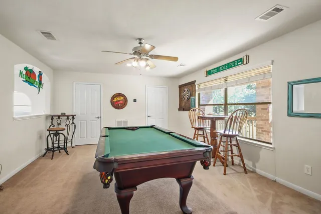 a room with furniture and a window