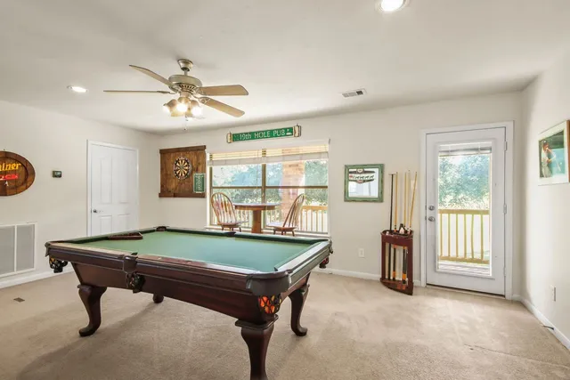 a view of balcony with wooden floor