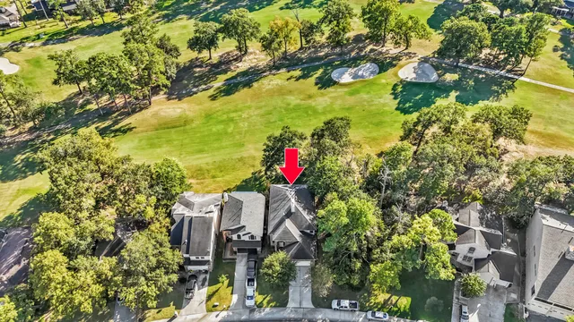 a bird view of house along with trees