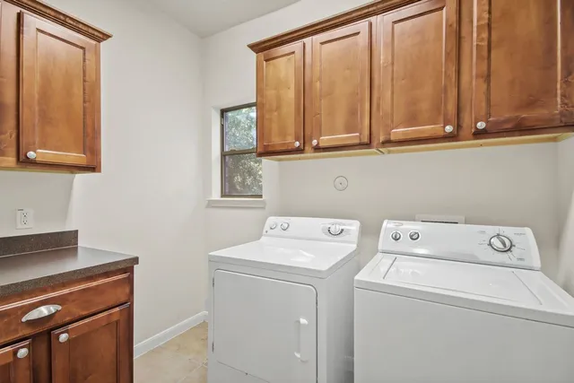 a view of an entryway with table and chairs