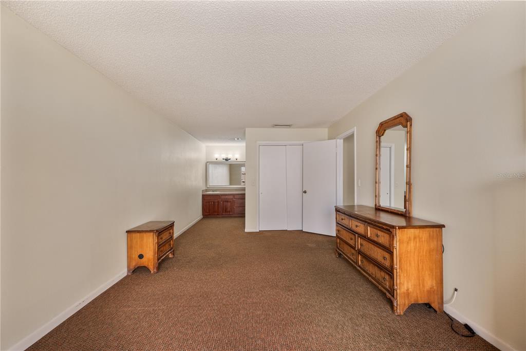 4231 Oak Loop, Unit 51 Mulberry, FL 33860 - Photo 18 of 29 an empty room with windows