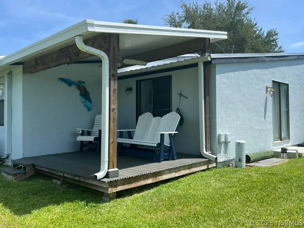 a view of a room with a large window