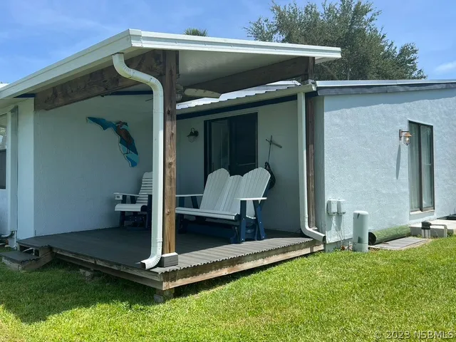a view of a room with a large window