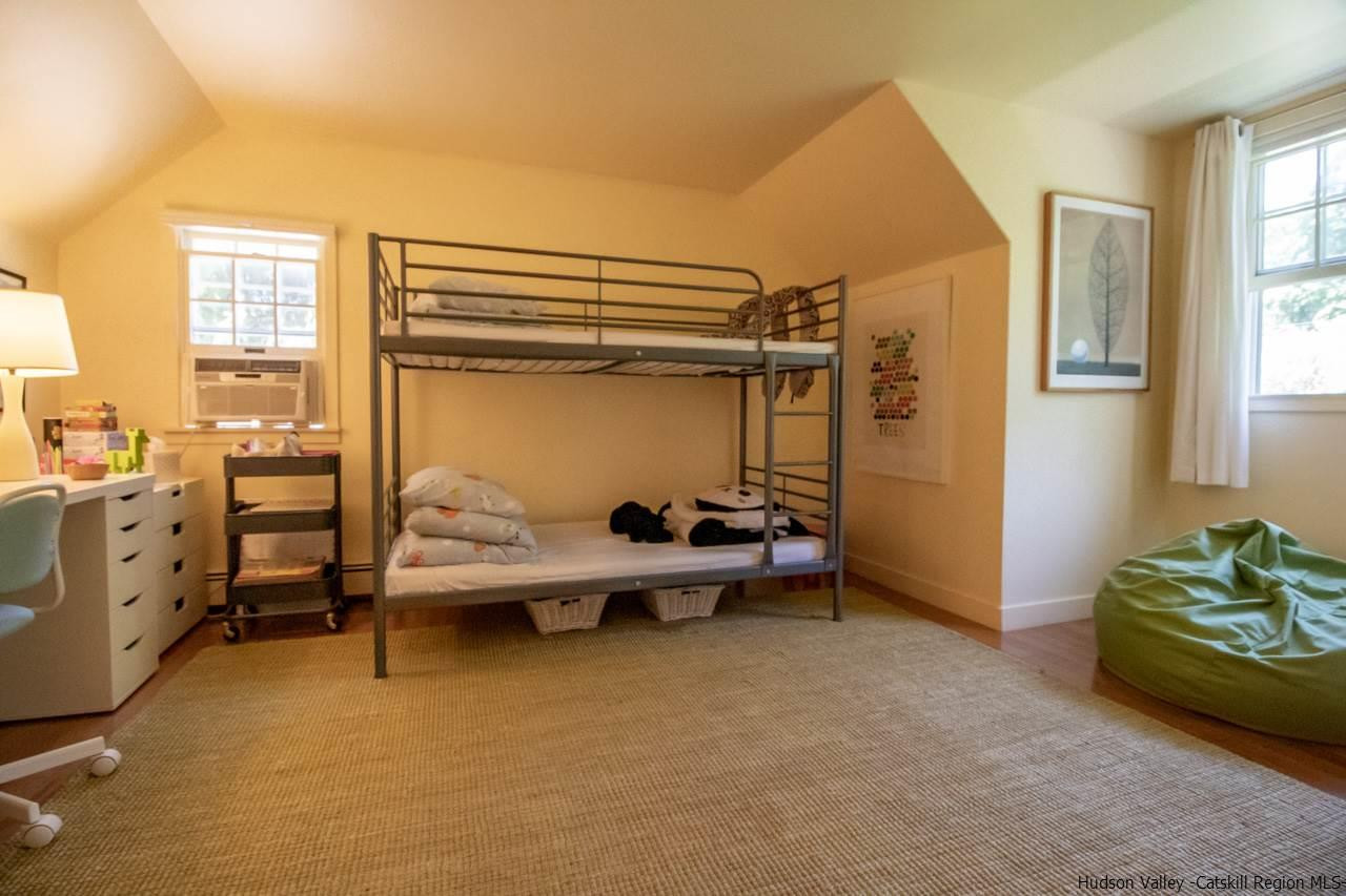 173 Peak Road Stone Ridge, NY 12484 - Photo 28 of 34 a bedroom with furniture and a window