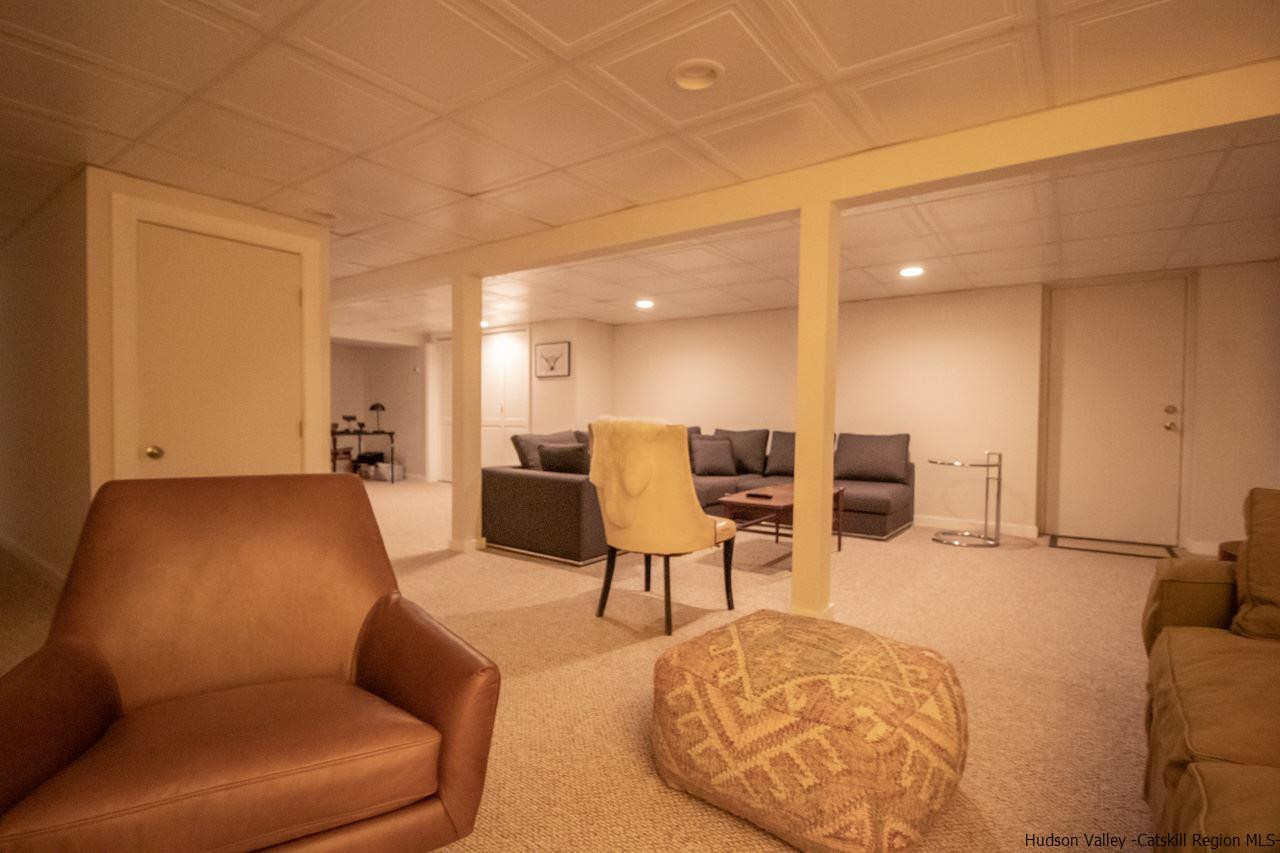173 Peak Road Stone Ridge, NY 12484 - Photo 34 of 34 a living room with furniture