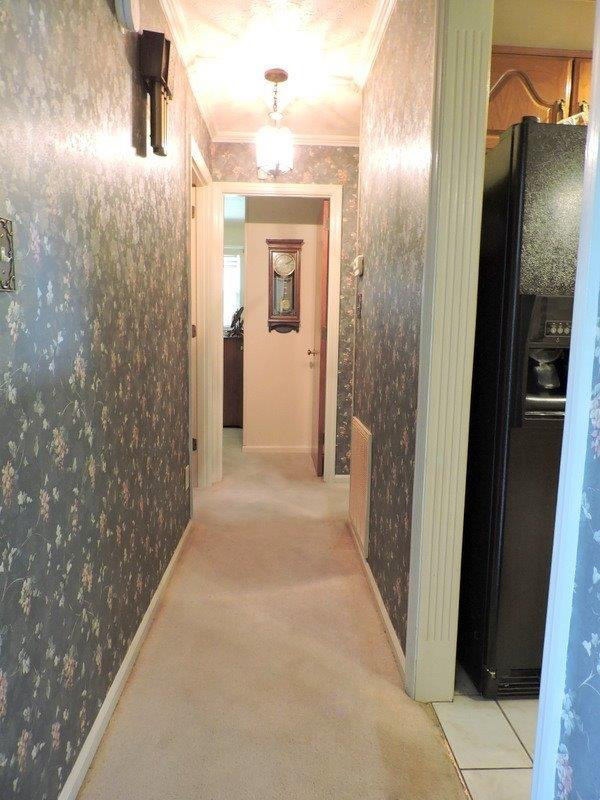 268 Dunroven Road Versailles, KY 40383 - Photo 11 of 31 Hallway leading to 3 bedrooms and first