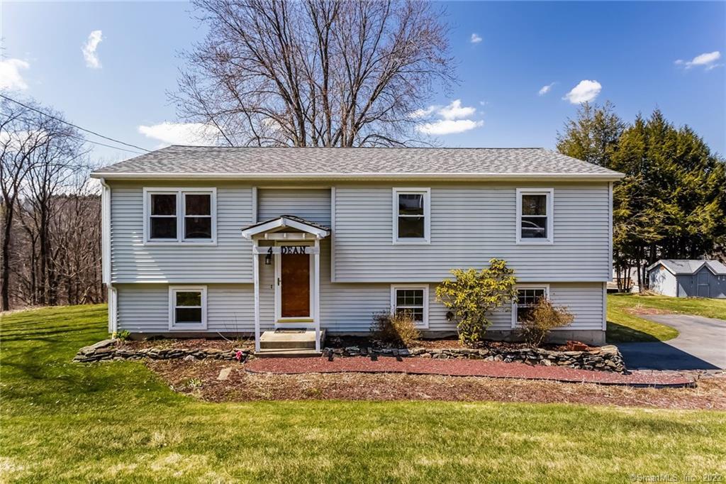 4 Dean Road New Milford, CT 06776 - Photo 1 of 1 a view of a house with backyard and sitting area