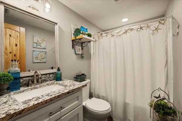 a living room with lots of furniture and couch