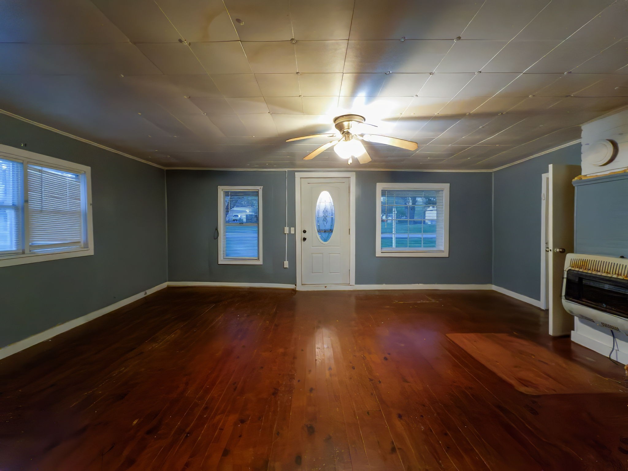 849 Jack Porter Road Lafayette, TN 37083 - Photo 17 of 56 a view of an empty room with wooden floor and a window
