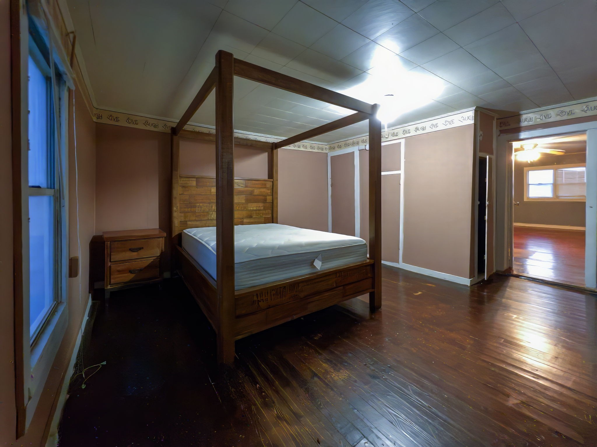 849 Jack Porter Road Lafayette, TN 37083 - Photo 30 of 56 a bedroom with a bed and wooden floor